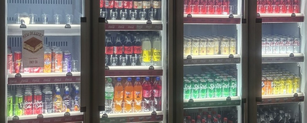 Selection of chilled soft drink cans